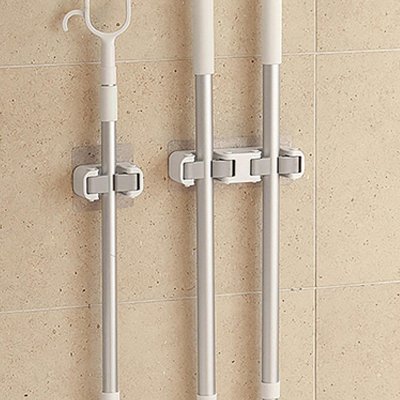 Le Porte balai mural s'adapte automatiquement aux manches de différents diamètres