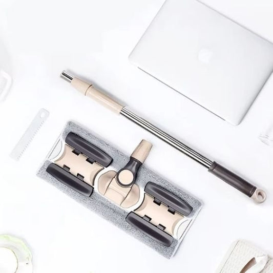 Un balai serpillère avec sa tige de 84 à 133 cm et son panneau de 40 x 14 cm